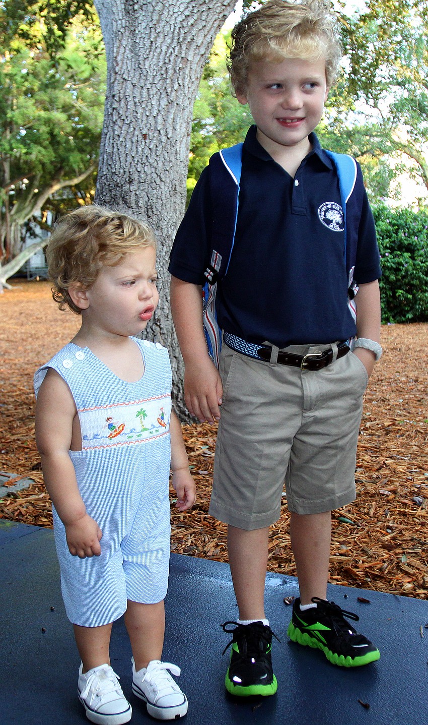 Brooks Becker, 2, was teary-eyed and crying over the fact that his brother, Will, 7, had to go back to school Wednesday, Aug. 24 at Out-of-Door Academy.
