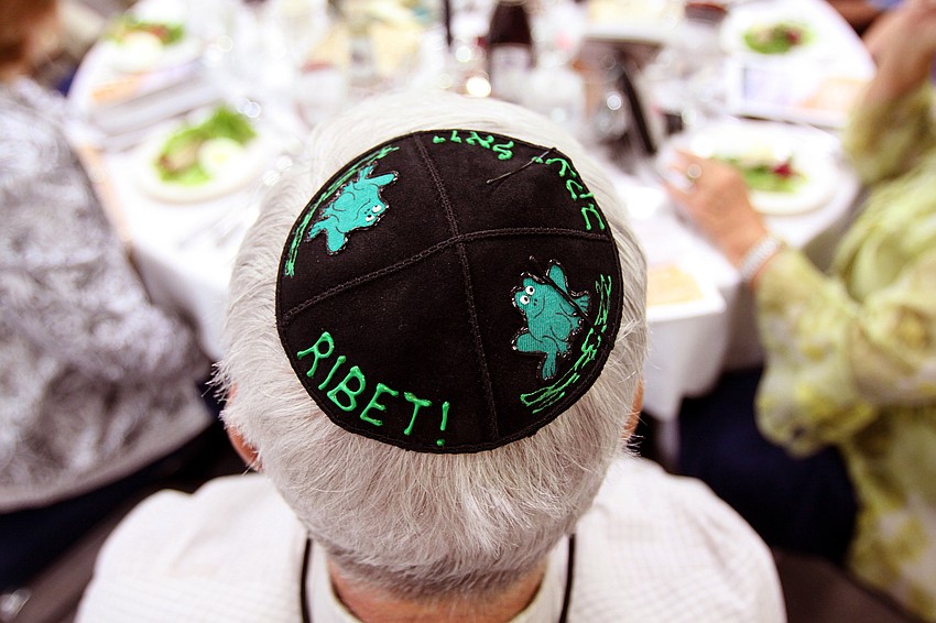Cantor Joel Reznick's unique yamaka was given to him over 20 years ago and he still wears it to religious events. Cantor Reznick wore his yamaka on Monday, April 18 to Temple Emanu-El's Seder dinner.