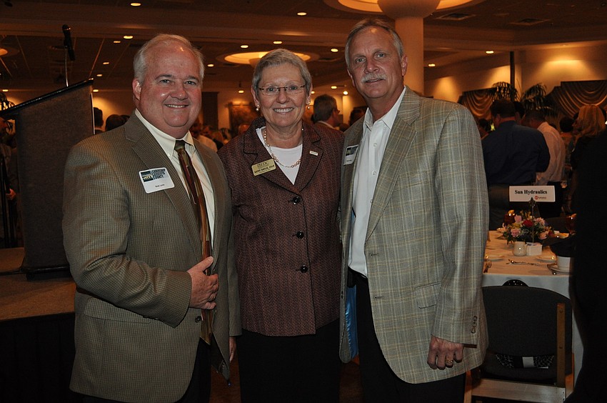 Rob Lane, EDC President and CEO Kathy Bayliss and Kevin Hicks