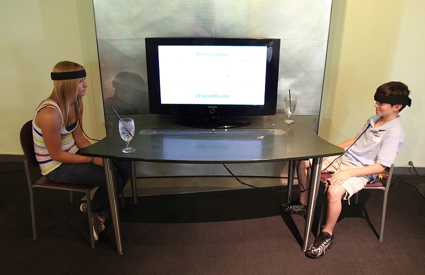 Kayla Wilson and Brandon Wilson play the mind ball game at the opening of the G. WIZ Faulhaber Fab Lab Thursday, May 5 at G. WIZ.