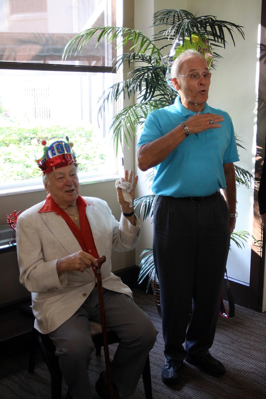 Jerry Koenke, the manager of the Regency House, gives a little speech about Walter Derdeyn at his 100th birthday party Friday, May 6 at the Regency House.