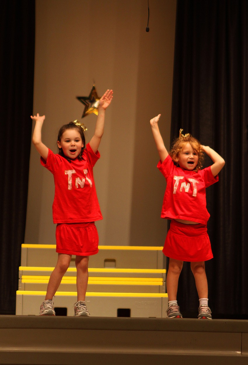 Kindergarteners Delaney O'Fallon and Lindsey Mercier perform to 