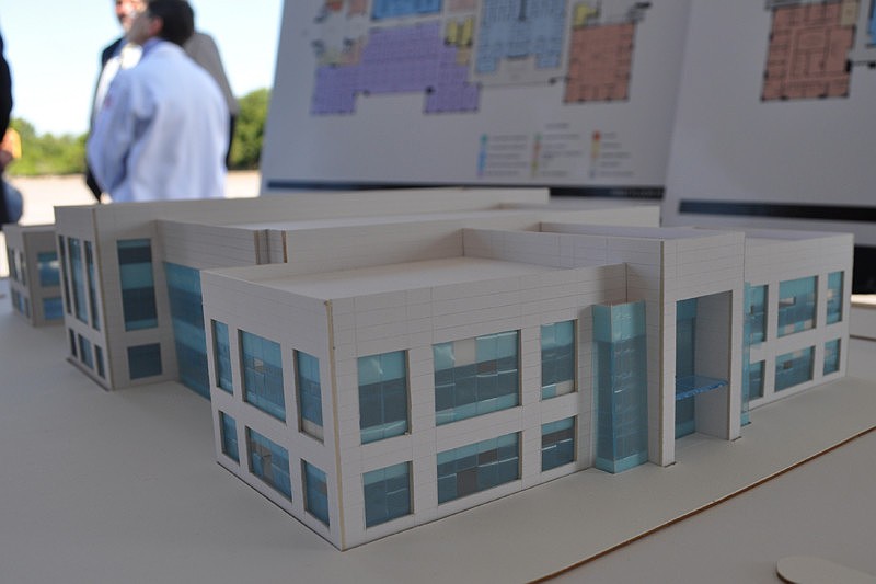 A model of the 100,000 square foot building was available for viewing, as were floor plans.