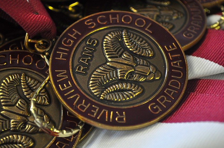 Graduates of Riverview High School received commemorative medals to wear around their necks.