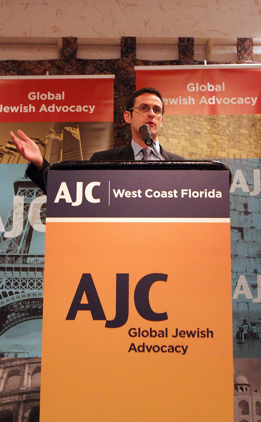Ari M. Gordon talks to the crowd during his lecture called Uneasy Allies: Building Christian and Muslim Partnerships in an Age of Fundamentalism, Wednesday, June 16 at Michael's on East.Â