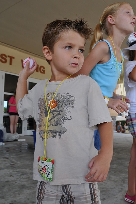 Alex Lamb threw a water-soaked ball at his team leader during the splash ball basketball game.