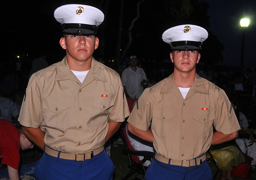 Mark Silva and Scott Isner, both in the Marine Corps Reserve, get ready to watch the Bayfront Fireworks Spectacular Monday, July 4 at Island Park.