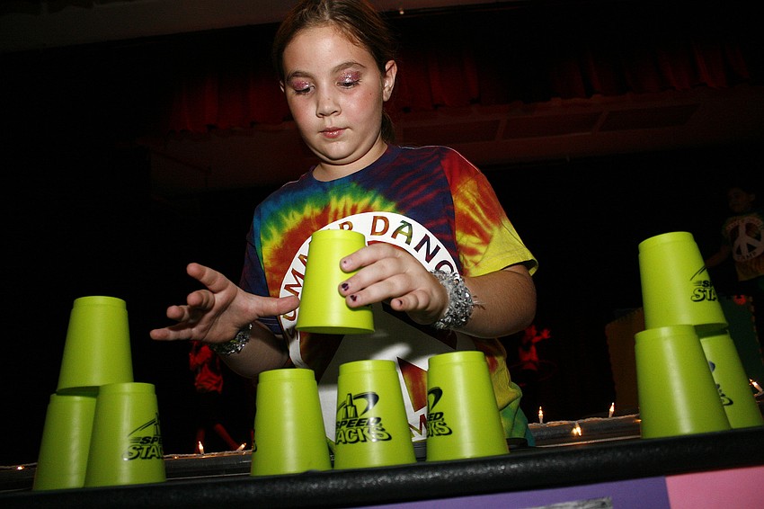 Carly Lynch has quick hands in cup stacking.