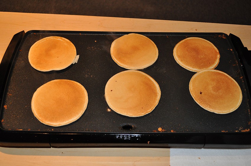 Pancakes get nice and brown on the griddle.