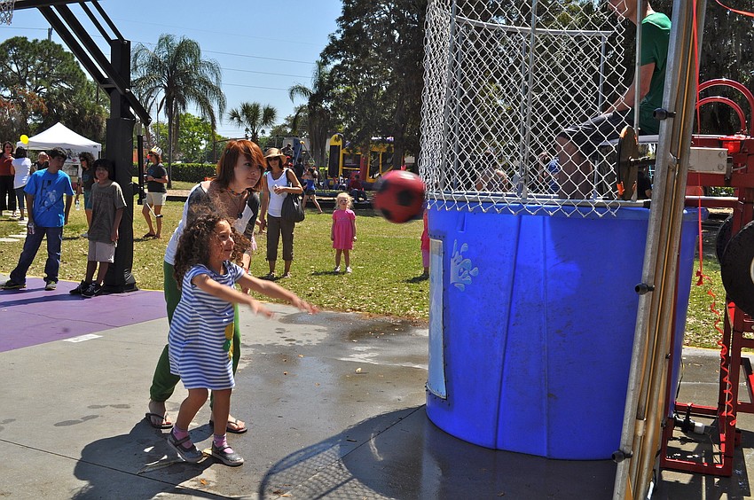Marybeth Damico hurls a ball toward the dunk tank.