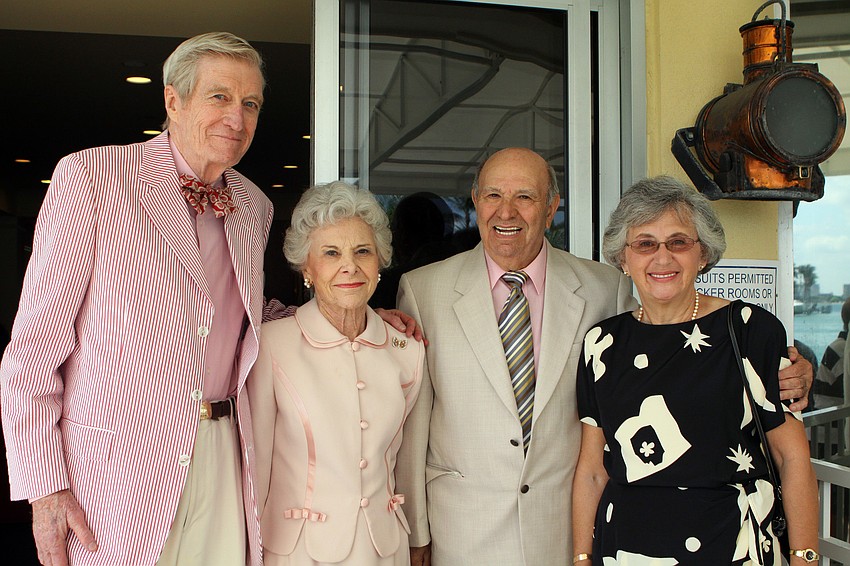 Justin and Jane Tracy pose with Placido and Maria Sangiorgio Sunday, April 24 at Bird Key Yacht Club's Easter celebration.
