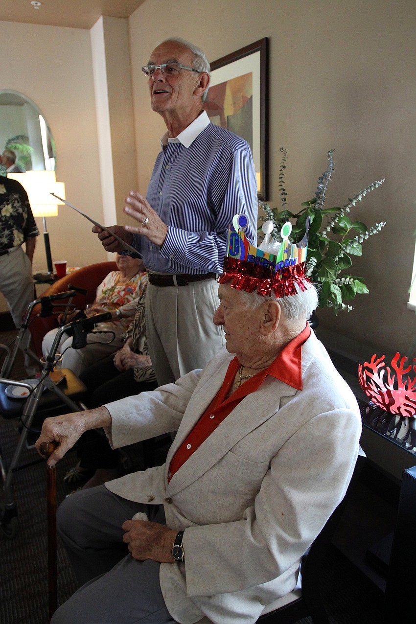 George Chorba talks about Walter Derdeyn at Derdeyn's 100th birthday party Friday, May 6 at the Regency House.
