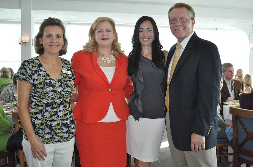 Anne McFall and incoming president Lisa Ward with Paula Domino