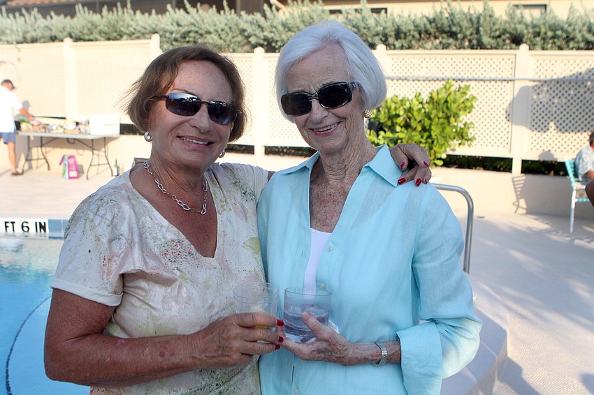 Marion Levine and Liz Cohen pose together at Harbour Circle's End of Season BBQ Sunday, May 22 at the pool.