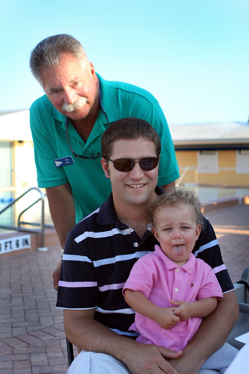 James Whitney Sibley III, IV and the V pose together by the pool Saturday, May 28 at Bird Key Yacht Club's Memorial Day party.
