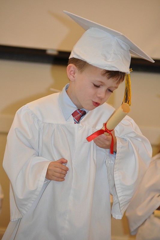 Cameron Phayre danced in his seat after getting his diploma.