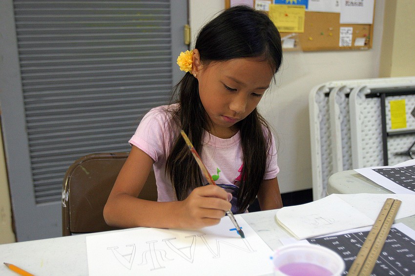 Maya Rudo, 8, begins painting her piece Tuesday, June 14 during the It's All Greek To Me! summer art class at Art Center Sarasota.