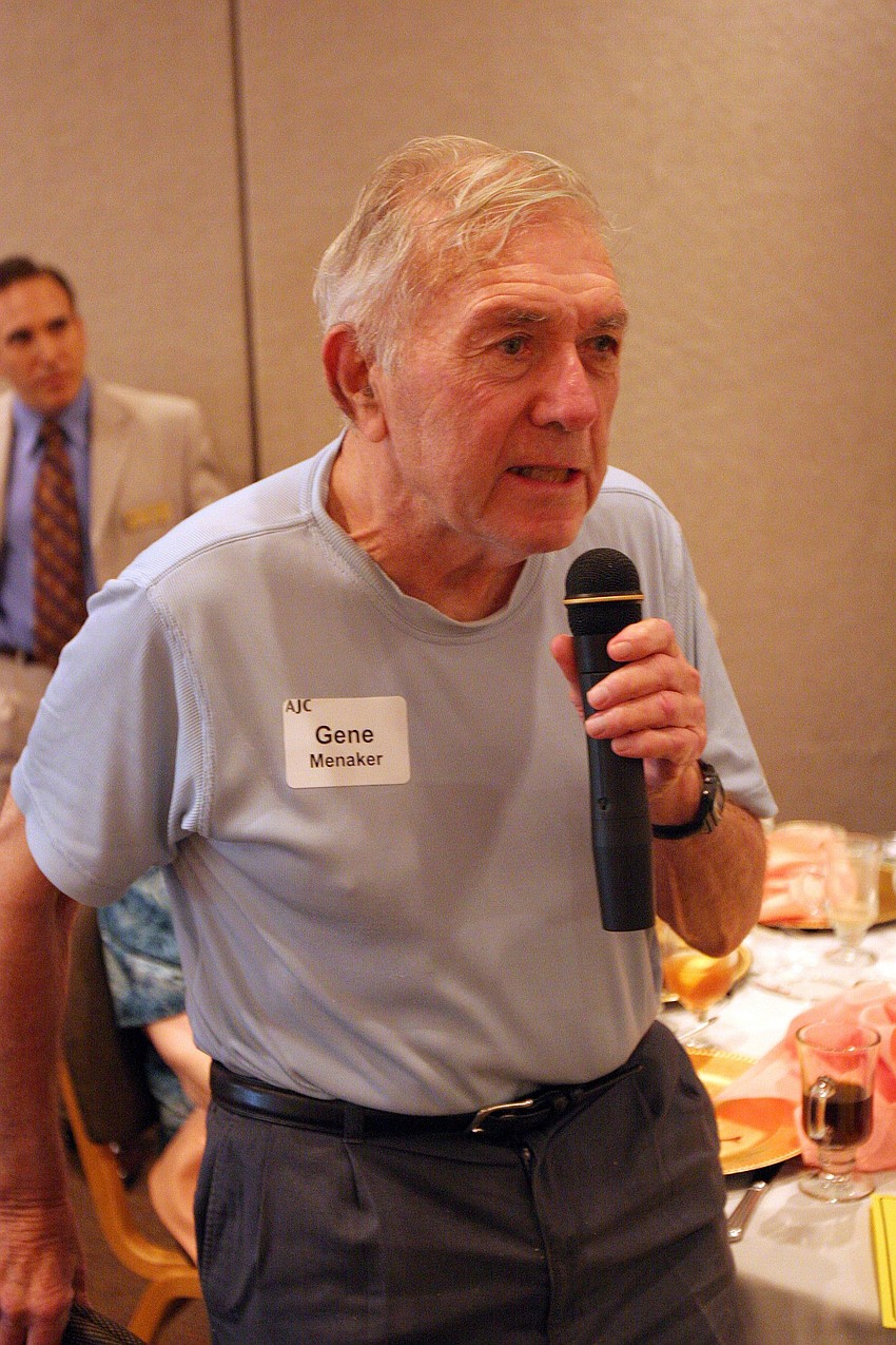 Gene Menaker asks guest speaker, Ari M. Gordon, a question during AJC's Lunch and Lecture, Wednesday, June 16 at Michael's on East.