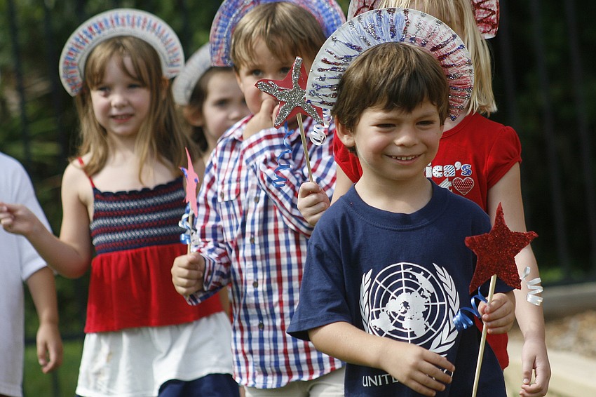 Parker Ellis, right, marched with his classmates.