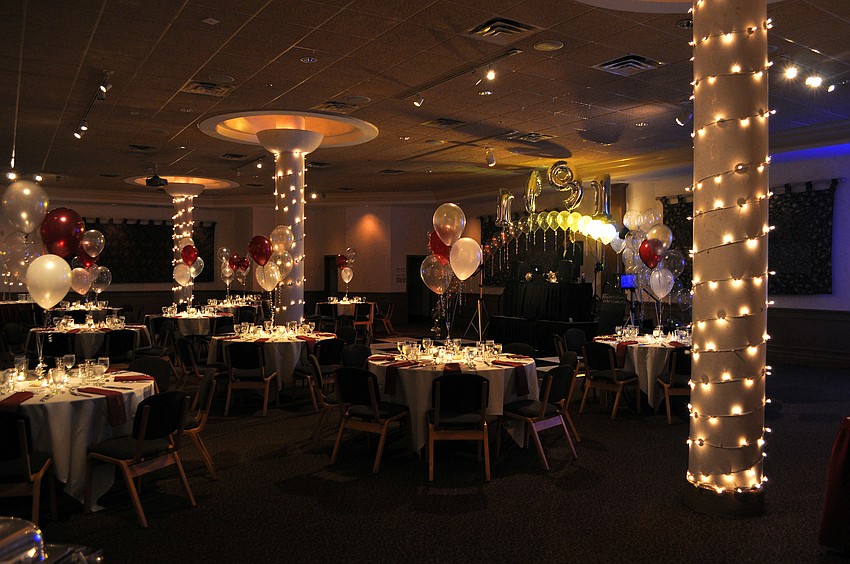 The dining and dancing area was decorated in Riverview colors with plenty of balloons including four silver numbered balloons that came together to be â€œ1991â€.