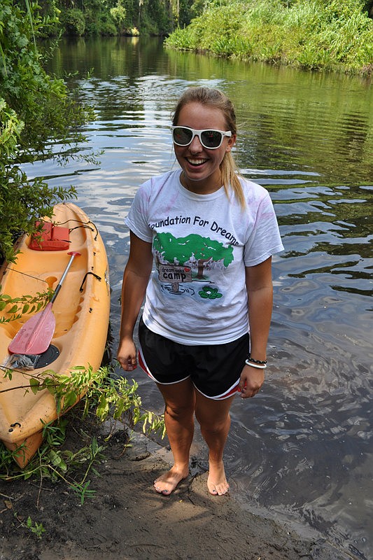 Lifeguard Elizabeth Ivey helped get campers situated in their canoes.