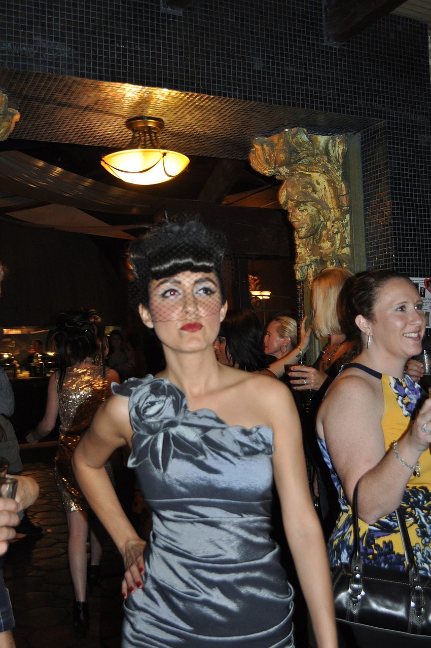 The event featured a fashion show by Cache.