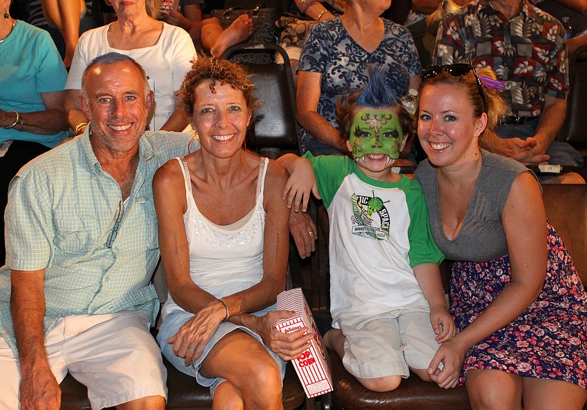Sonny and Victoria Thamer pose with Benjamin, 6, and Tiffany Apostolou Thursday, Aug. 18 while attending the American Youth Circus Organizationâ€™s showcase performance inside the PAL Sailor Circus Arena.