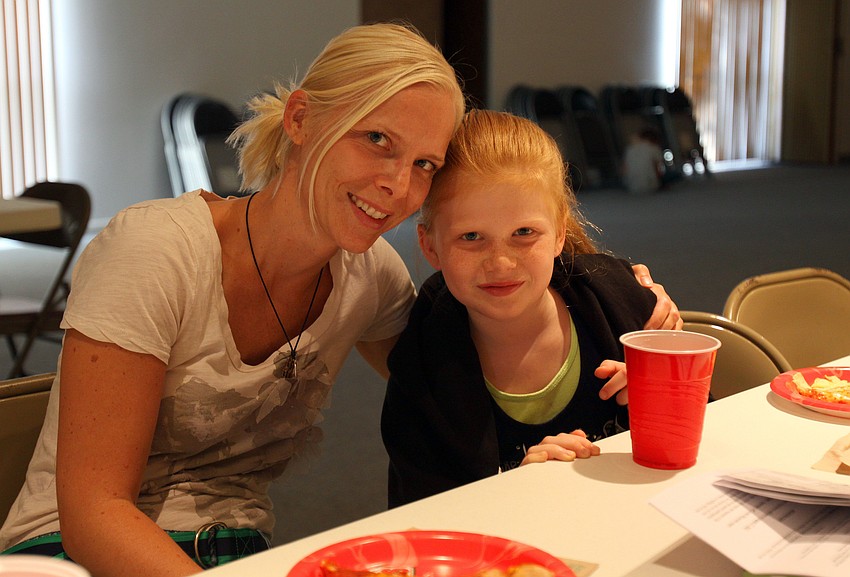 Stephanie and Eloise, 8, DeVary pose together during Family Fun Movie Night Friday, Aug. 26 in the Parish Hall.