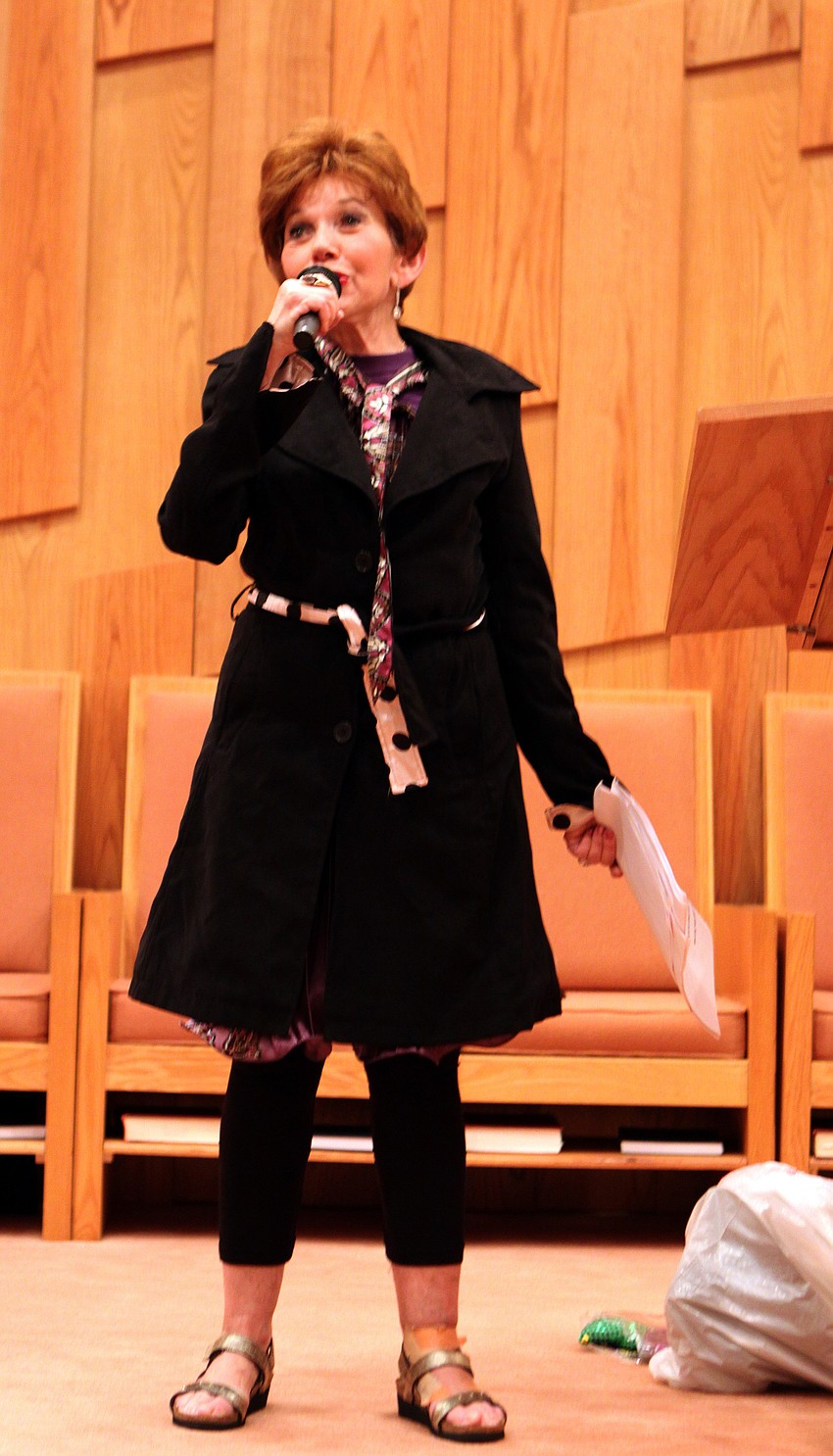 Judy Goldstein sings a song during the Purim play on Saturday, March 19 at Temple Beth Israel. Goldstein also wrote the play that was performed.