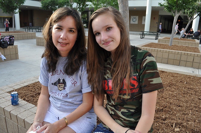Pamela McFall enjoyed pizza with her daughter Michelle.