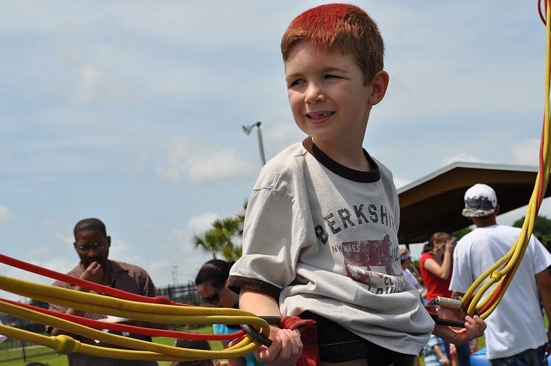 Trey Fraser, 6, jumped as high as he could.