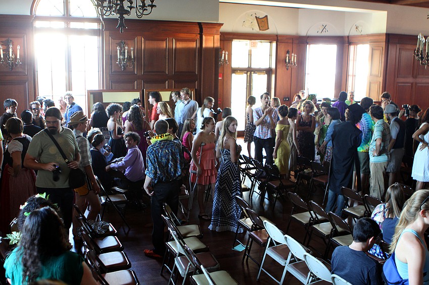 The class of 2011 gather inside College Hall to primp, take photos and line up for the graduation ceremony.