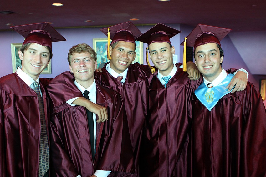 Greg Galmin, Johnny Routt, Jereme Johnston, Manuel Chepote and Mario Lopez get together for a photo before graduating Friday, May 27 at the Van Wezel Performing Arts Hall.