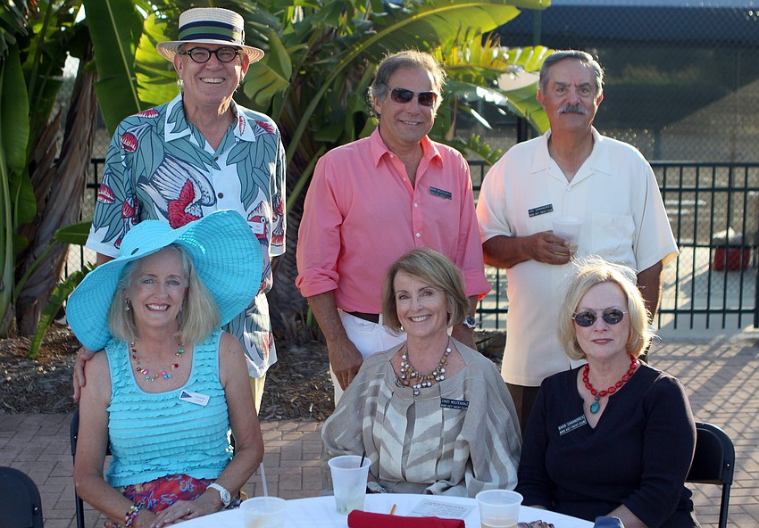 Bill and Annette Lloyd, Mark and Cindy Wolfendale and Lou and Barb Sanandres pose at their table Saturday, May 28 at Bird Key Yacht Club's Memorial Day party.