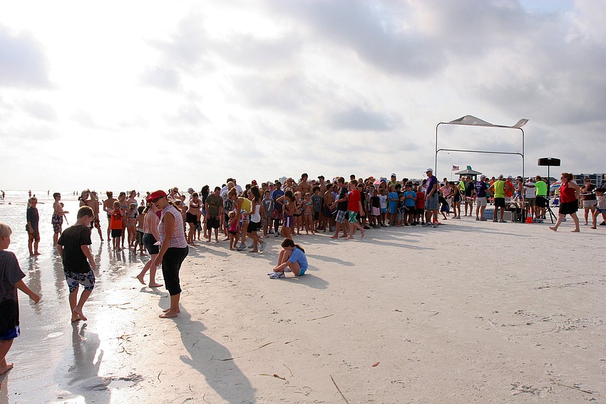 Participants get ready to run in the 1-mile fun run Tuesday, June 14 on Siesta Key Beach.