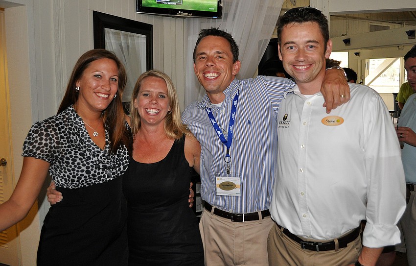 Venice YPG members Michelle Ryan, Kim Phillips, Dallas Council and Steve Burnett pose together Friday, June 17 at the wrap party.