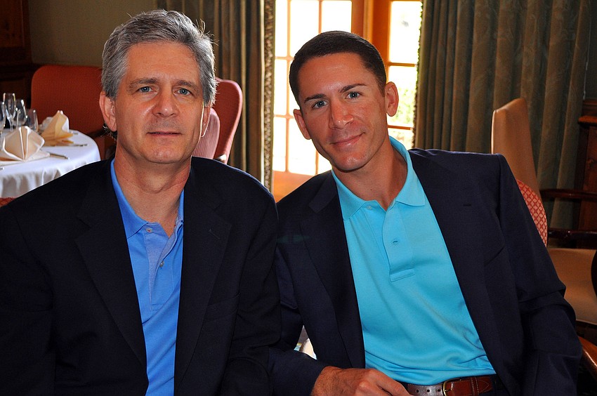 Ric Coffey poses with his son, Hamilton.