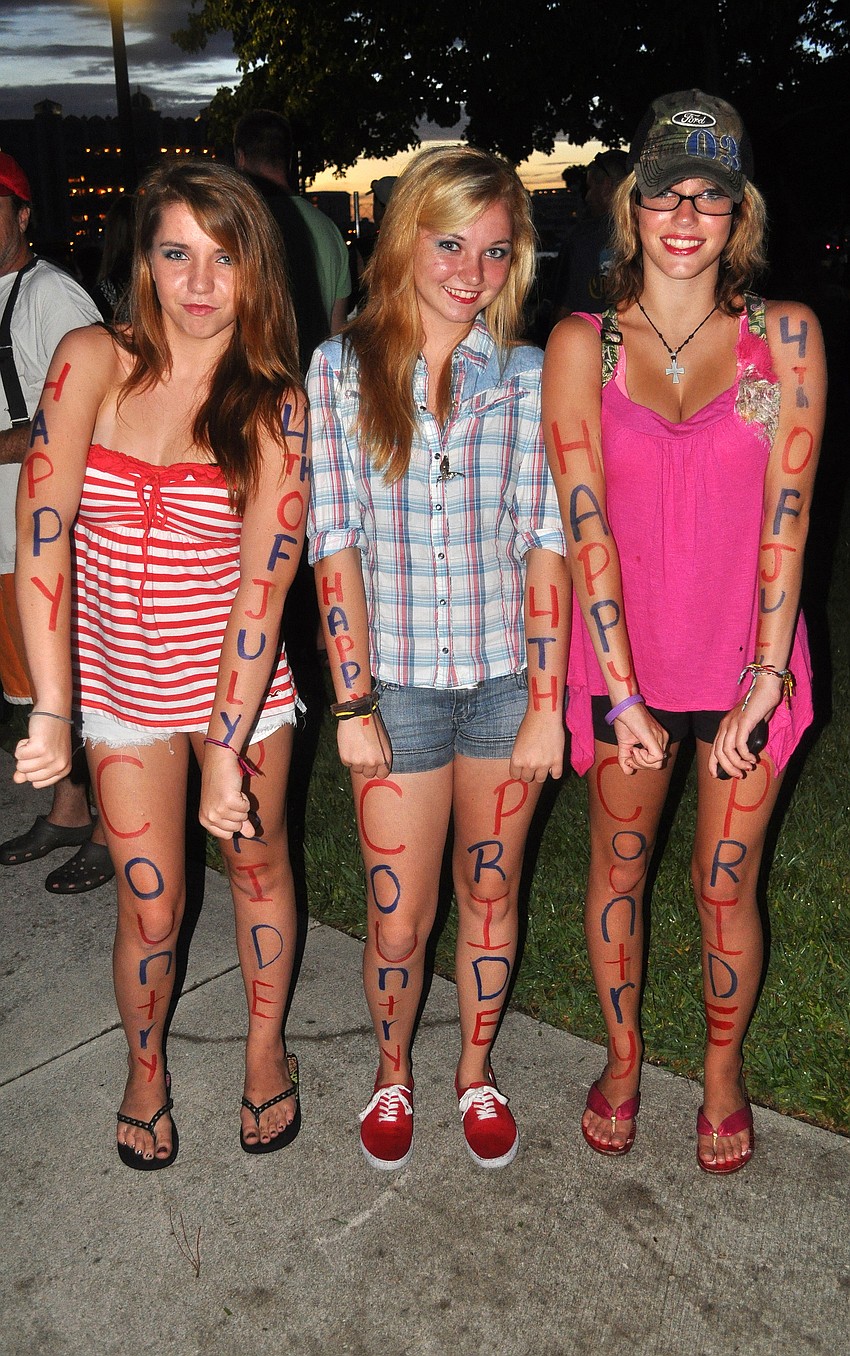 Cheyenne Griffith, 14, Brenna Griffith, 16, and Erin Gribbin, 15, wrote on their arms in legs in red and blue markers.
