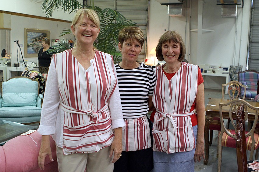 Nola Heitbrink, Kathy Purdy and Joan Wilson worked for days to get the estate sale set up.