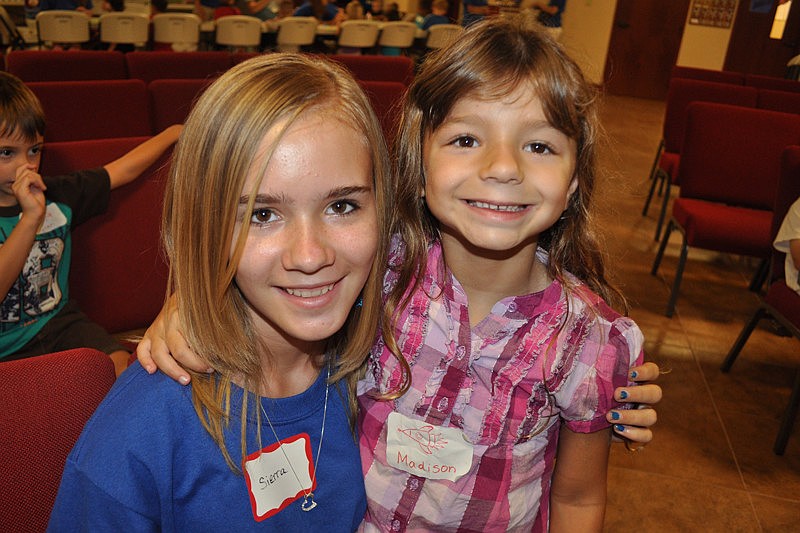Volunteer Sierra Mielke watched a drama with Madison DeSalvatore.
