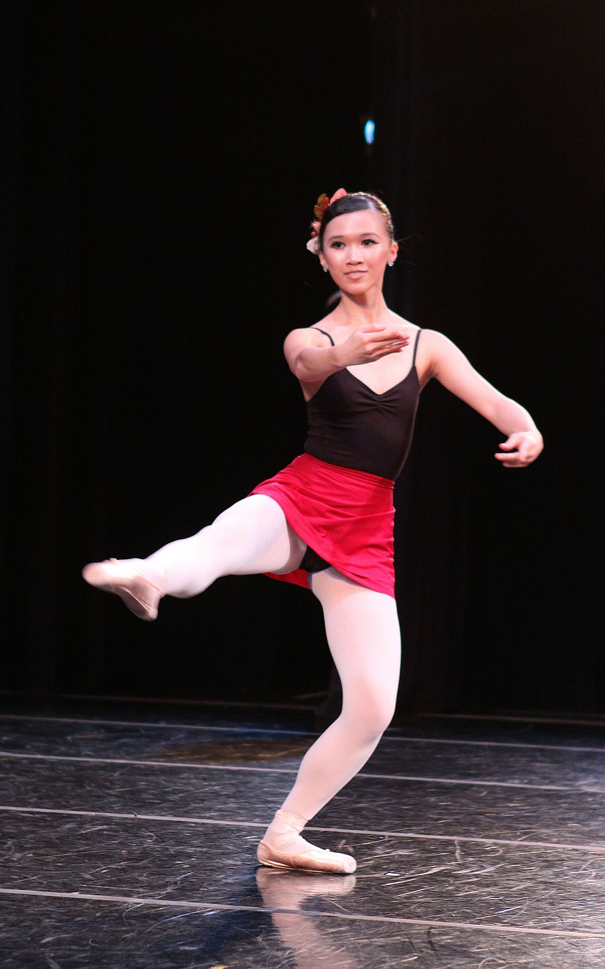 Janis Liu Man Ting, from Hong Kong, performs a small solo during the opening number Saturday, Aug. 13, at the FSU Center for the Performing Arts.
