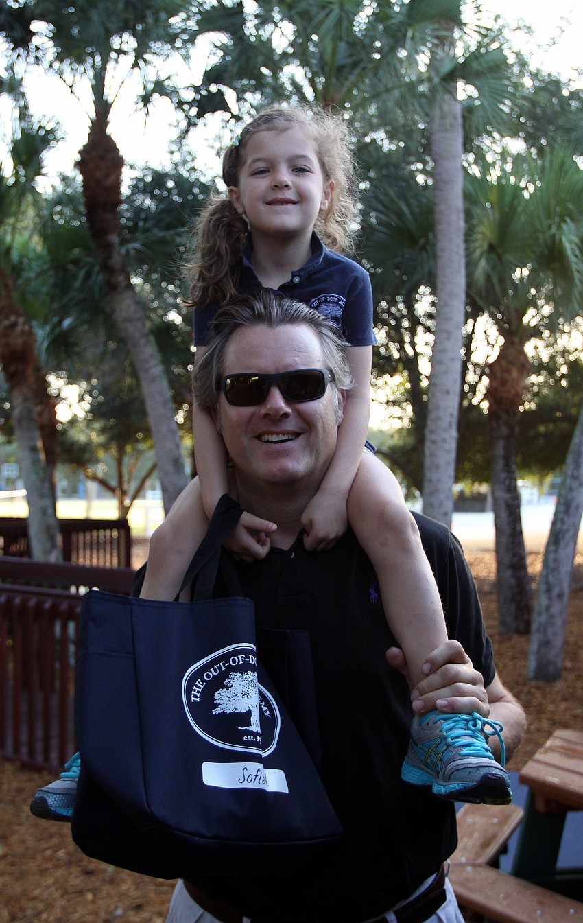 Sofie Niebuhr, 5, gets to travel in style to her Kindergarten class thanks to her dad, Ben, Wednesday, Aug. 24 at Out-of-Door Academy.