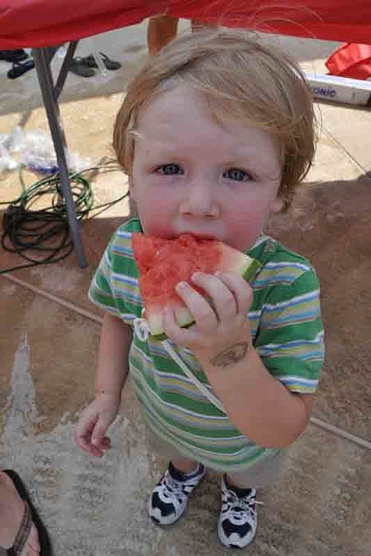 John Kelly, 21 months, feasted on watermelon.