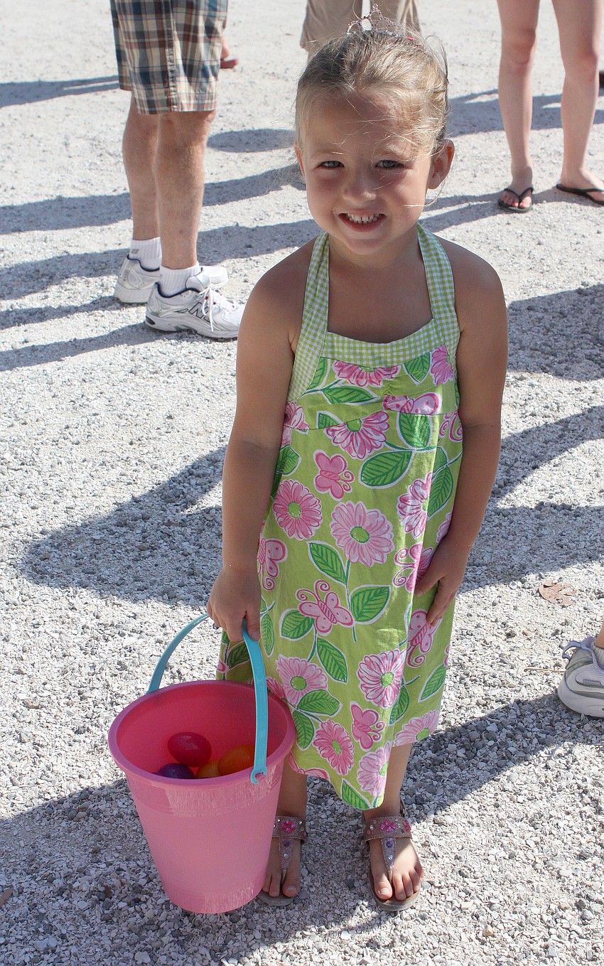 Kylie Huffman, 4, poses with her Easter egg bucket at Mar Vista.