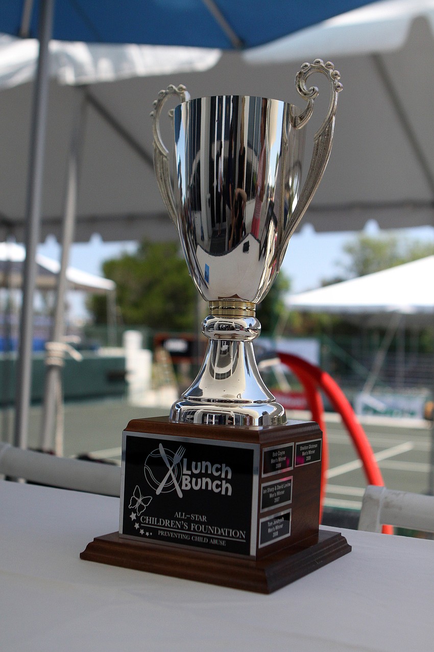 The trophy for the Lunch Bunch All-Star Children's Foundation fundraiser. Each year a man and a woman win the event and get to have their names put on the sides of the trophy.