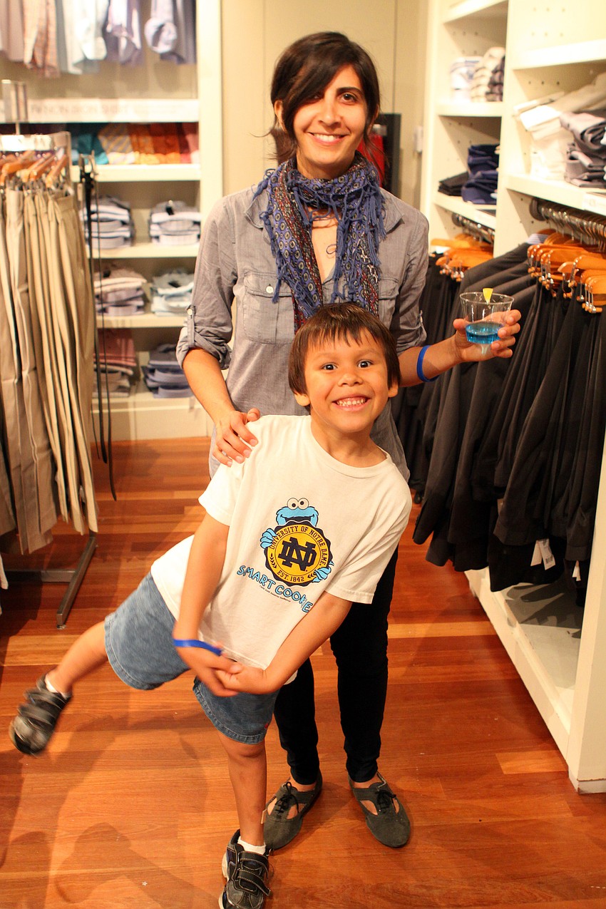 Hayley Enright with her son, Patrick, have fun at the Paint the Town Blue event Thursday, April 28 at Westfield Southgate.