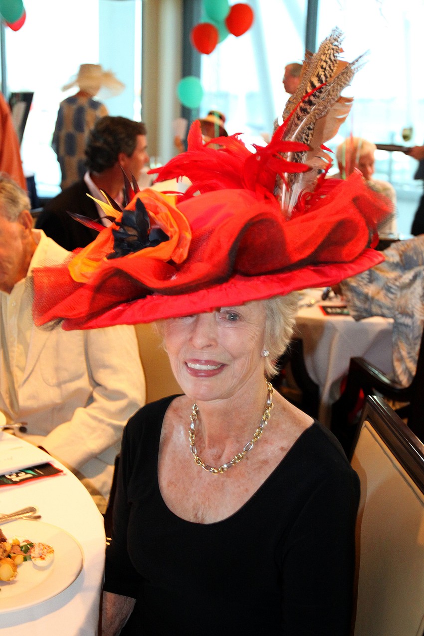 Dorothy Lawrence wore a beautiful red hat she borrowed from The Players Theater on Saturday, May 7 at the Kentucky Derby party at the Sarasota Yacht Club. Lawrence got an honorable mention in the Hat Contest.