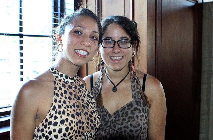 Alexis Schwartz and Dayna Lazarus wore animal printed attired at New College's 2011 Commencement ceremony Friday, May 20 at College Hall Bay Front.