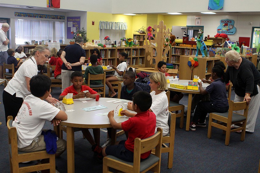 The students of Gocio Elementary School's bridge club play a few hands of bridge during their final meeting Monday, May 23 inside Gocico Elementary School's Media Center.