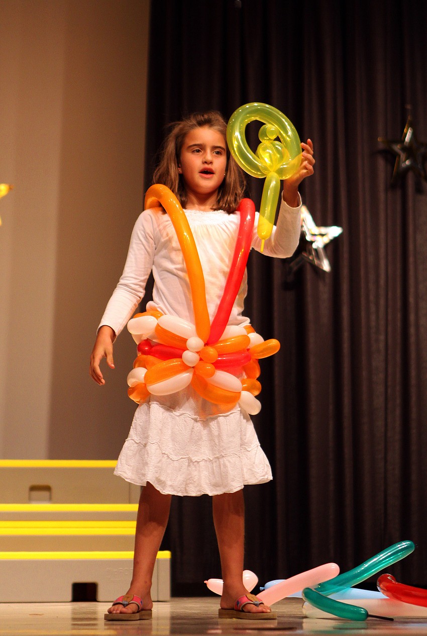 Mary Jane Fortenberry, 2nd, made balloon animals Wednesday, May 25 during 
